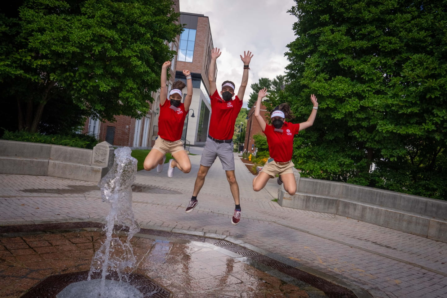 Students jumping at the Fountain