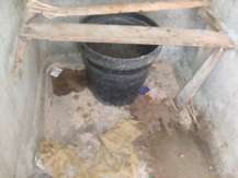 water and sanitation black buckets