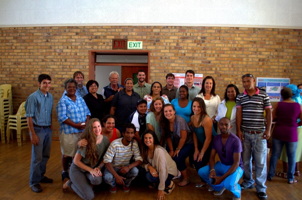 Members from the Flamingo Crescent community, CORC, ISN, City of Cape Town Informal Settlement Management department, WPI Advisors and students gathered for a picture after final presentations