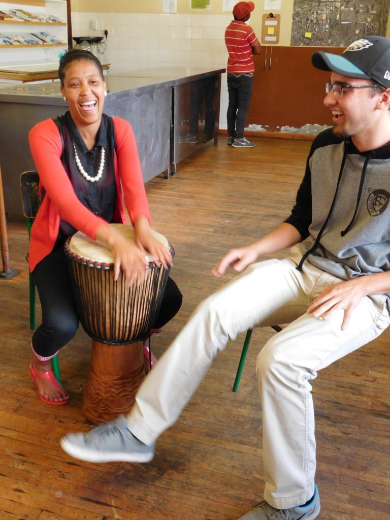 As part of the music programme, Aaron taught how to play basic beats on the djembe.