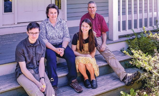 The Frey Family on the steps of their home in New Hampshire