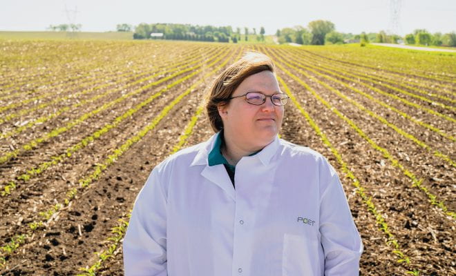 Jennifer Headman in a field of corn