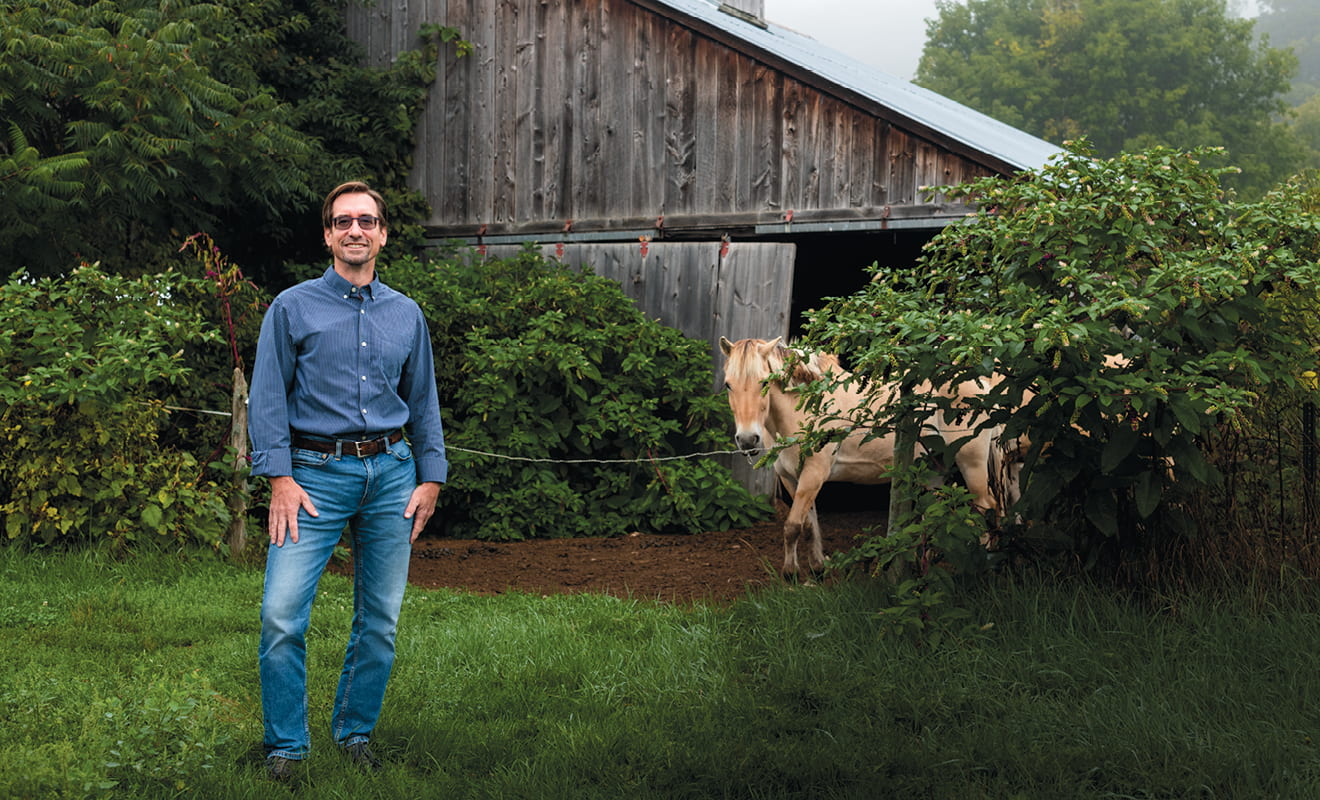 Don Seville on his farm in Vermont