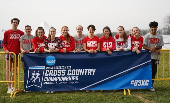 A group photo of the women's soccer team and the two men's team members who competed in the NCAAs.