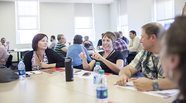 A group of faculty participate in a professional development workshop