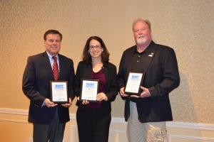 Massachusetts Water Resource Outreach Center Co-Director, Corey Denenberg Dehner (Center) accepts the 2016 Stormy Award. 